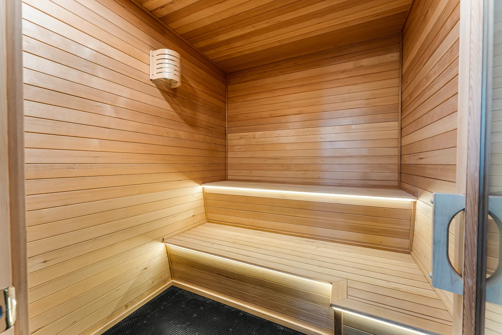 Cedar home sauna with under-bench LED strip lighting installation