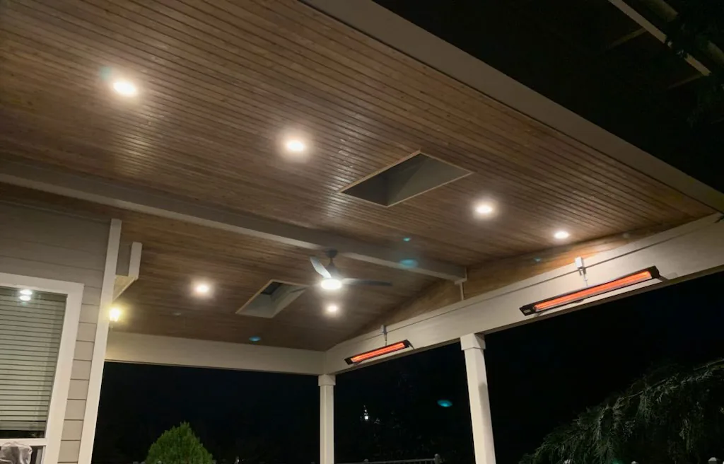 Covered patio with recessed lighting and overhead patio heaters