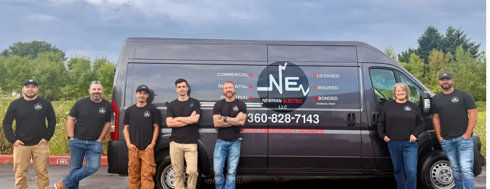 Newman Electric team in front of their company van: a Savo Group case-study electrical contractor